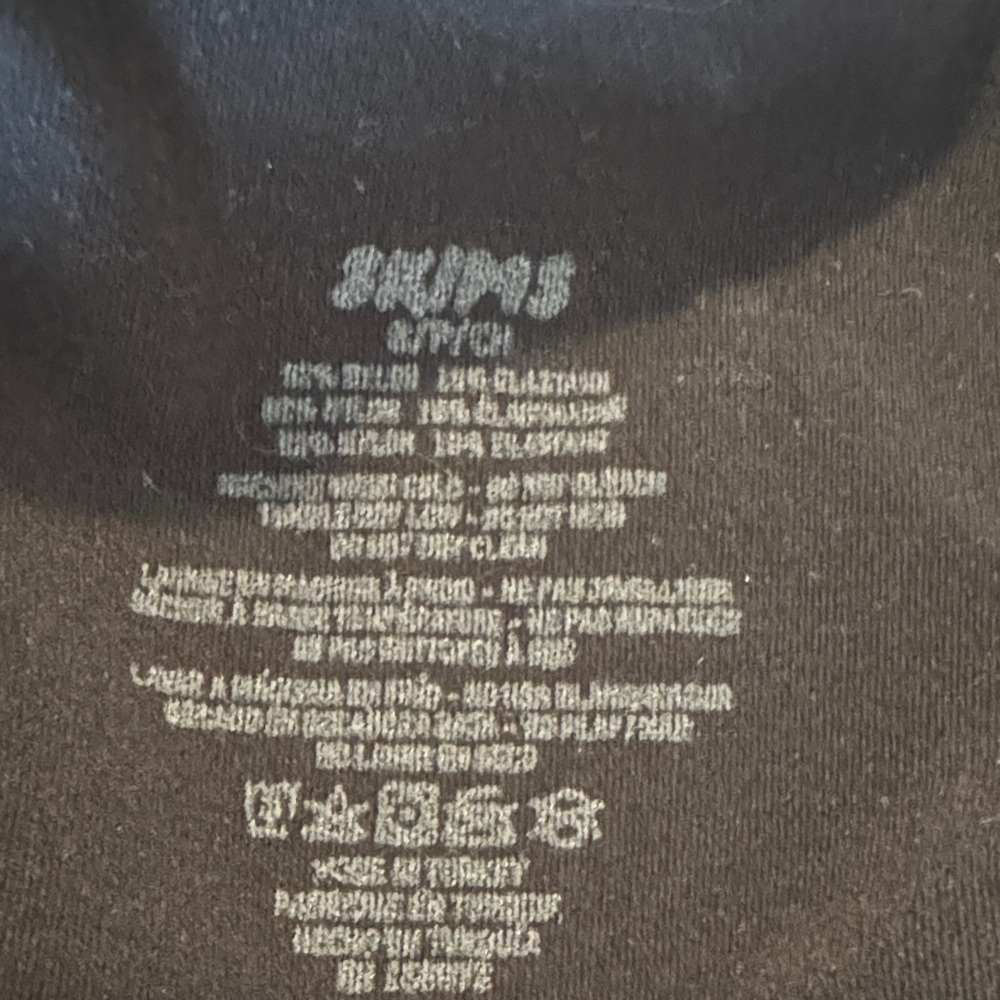 SKIMS Black Long Sleeve 3/4 zip up Top - Picture 2 of 5